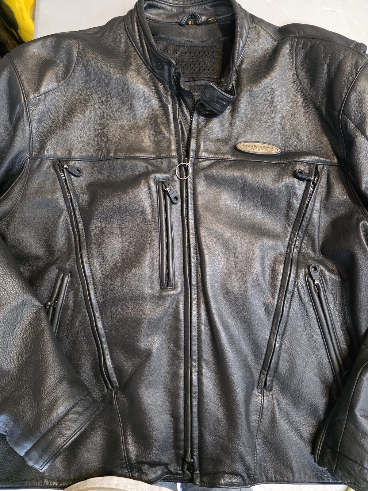 Restored black leather motorcycle jacket
