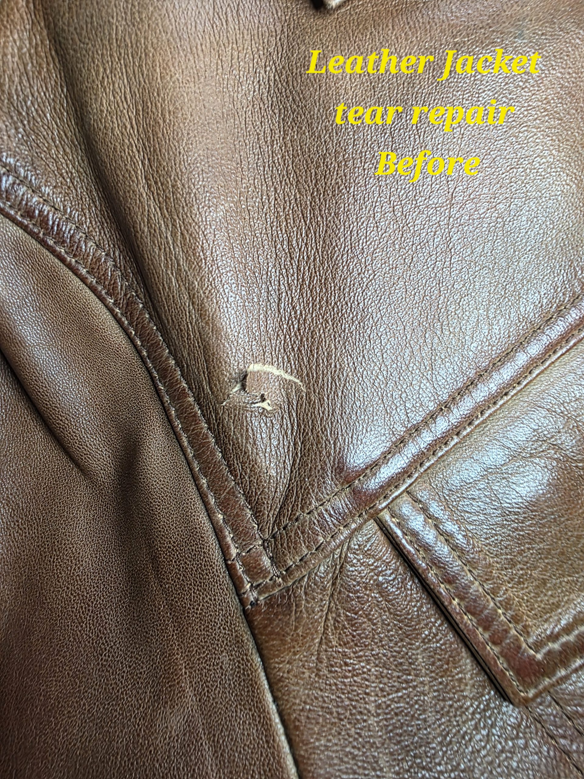 Leather jacket seam tear before repair