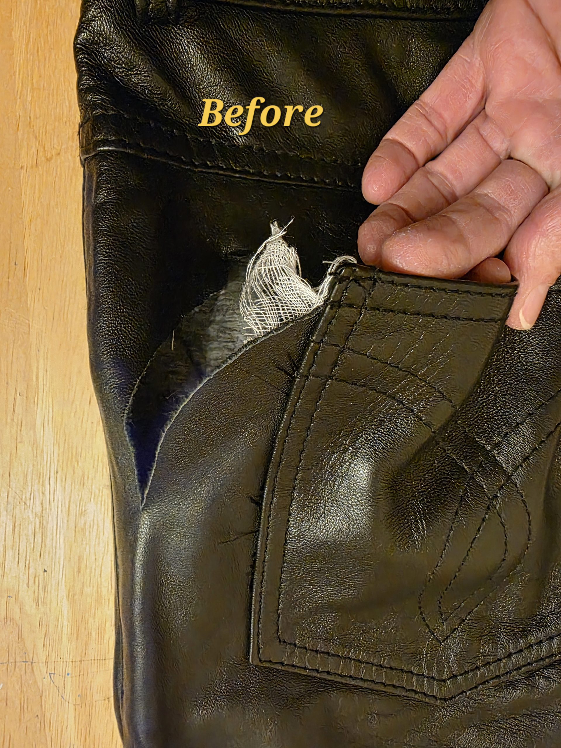 Leather pocket seam tear before repair