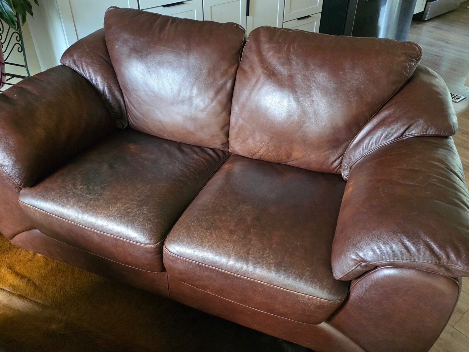Restored brown leather loveseat
