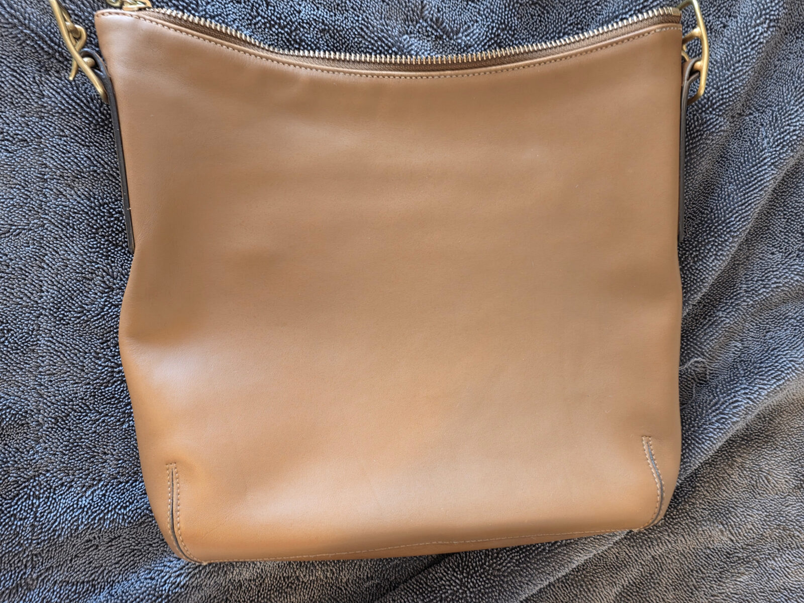 Restored tan leather tote bag