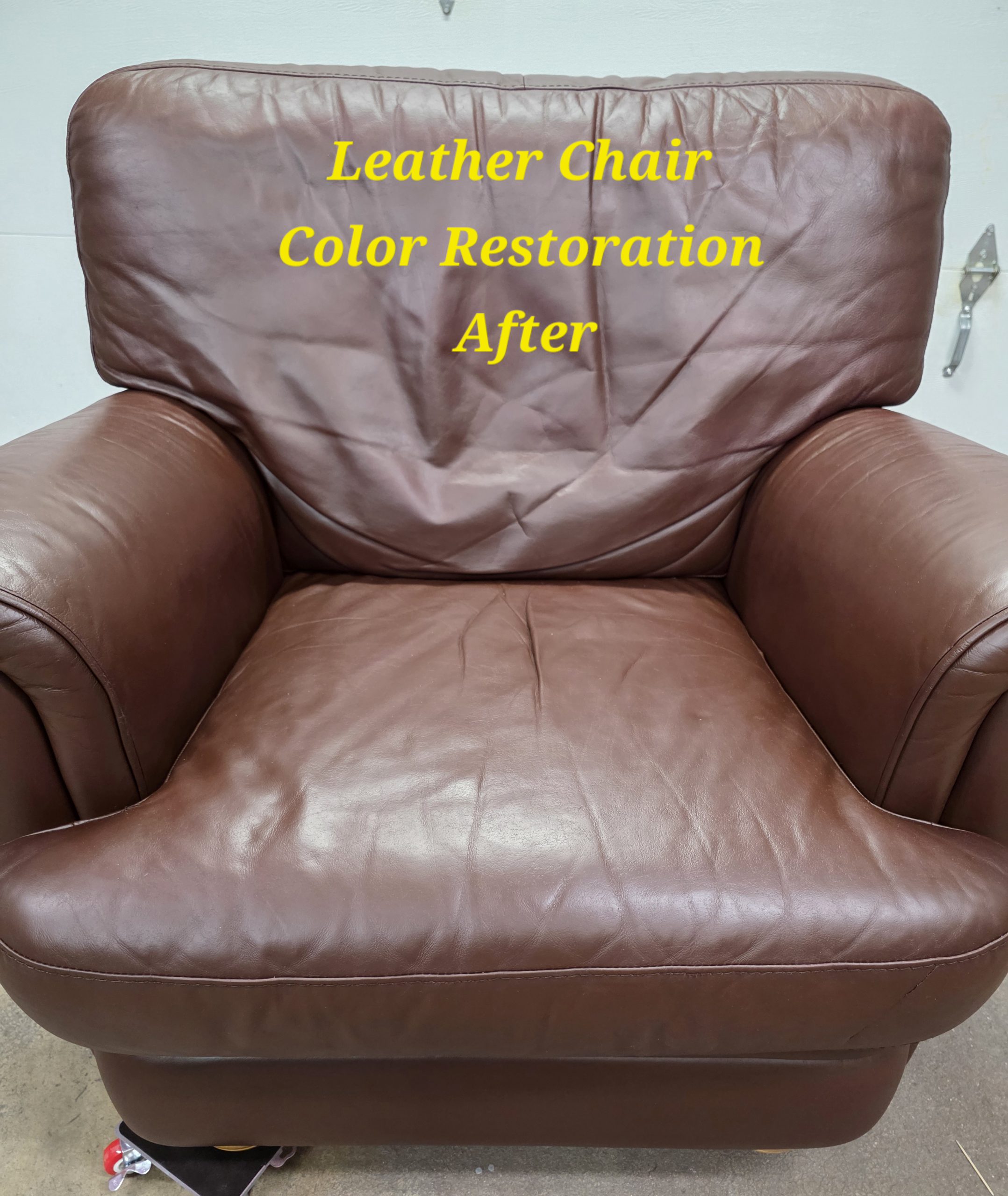 Leather chair cushion after color restoration