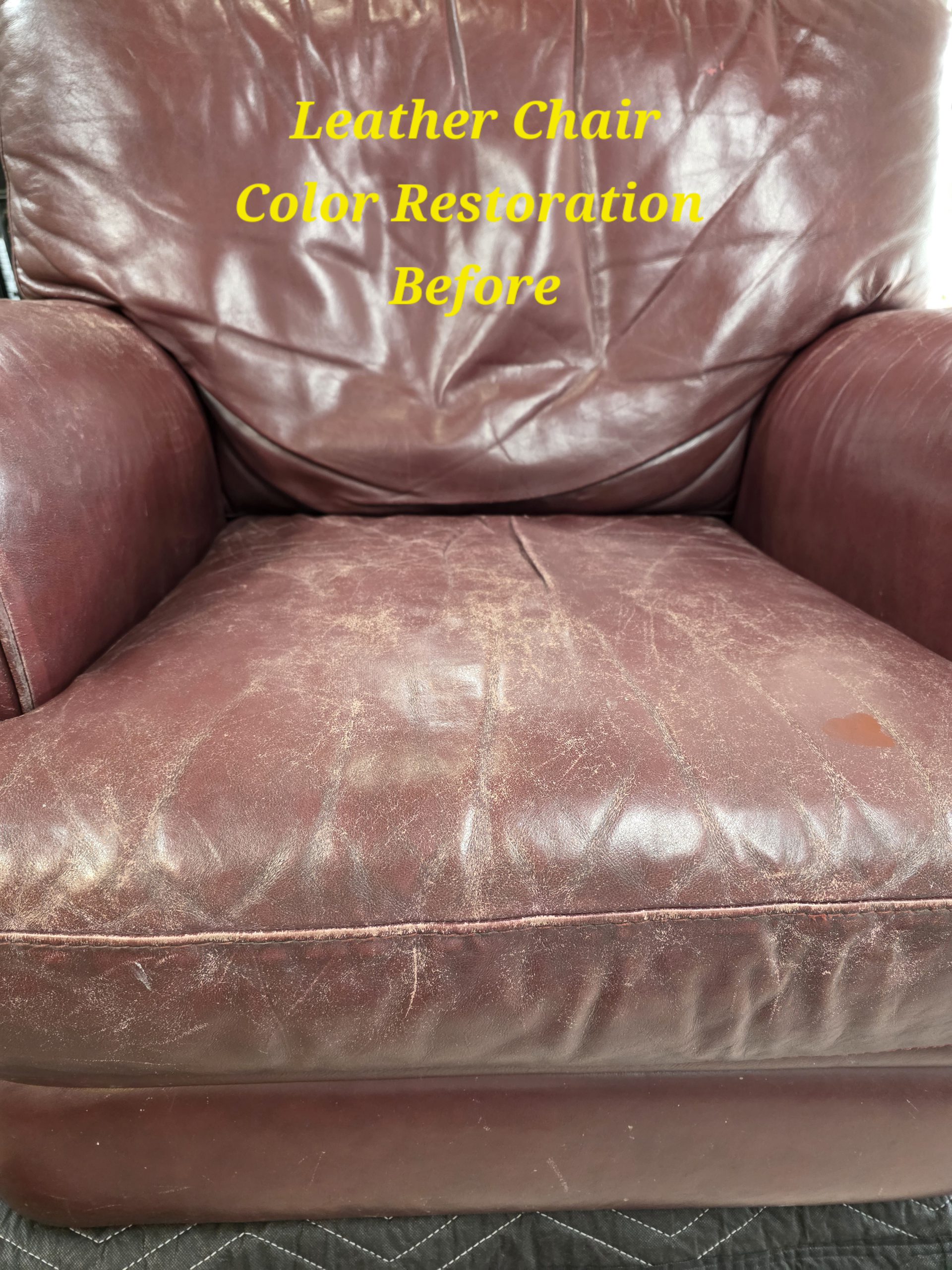 Leather chair cushion before color restoration