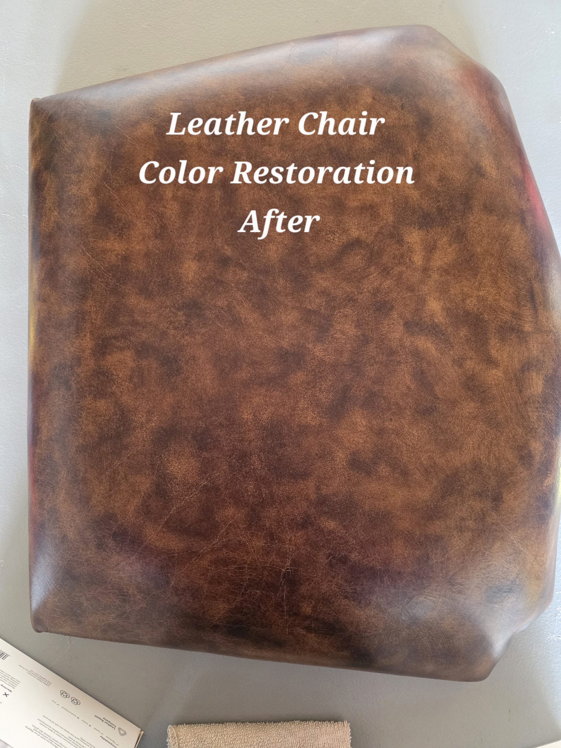 Leather armchair after color restoration